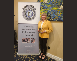 MPA Spring Newsletter: Image of Dr. Melissa Moon and award from Kentucky Women's Law Enforcement Network
