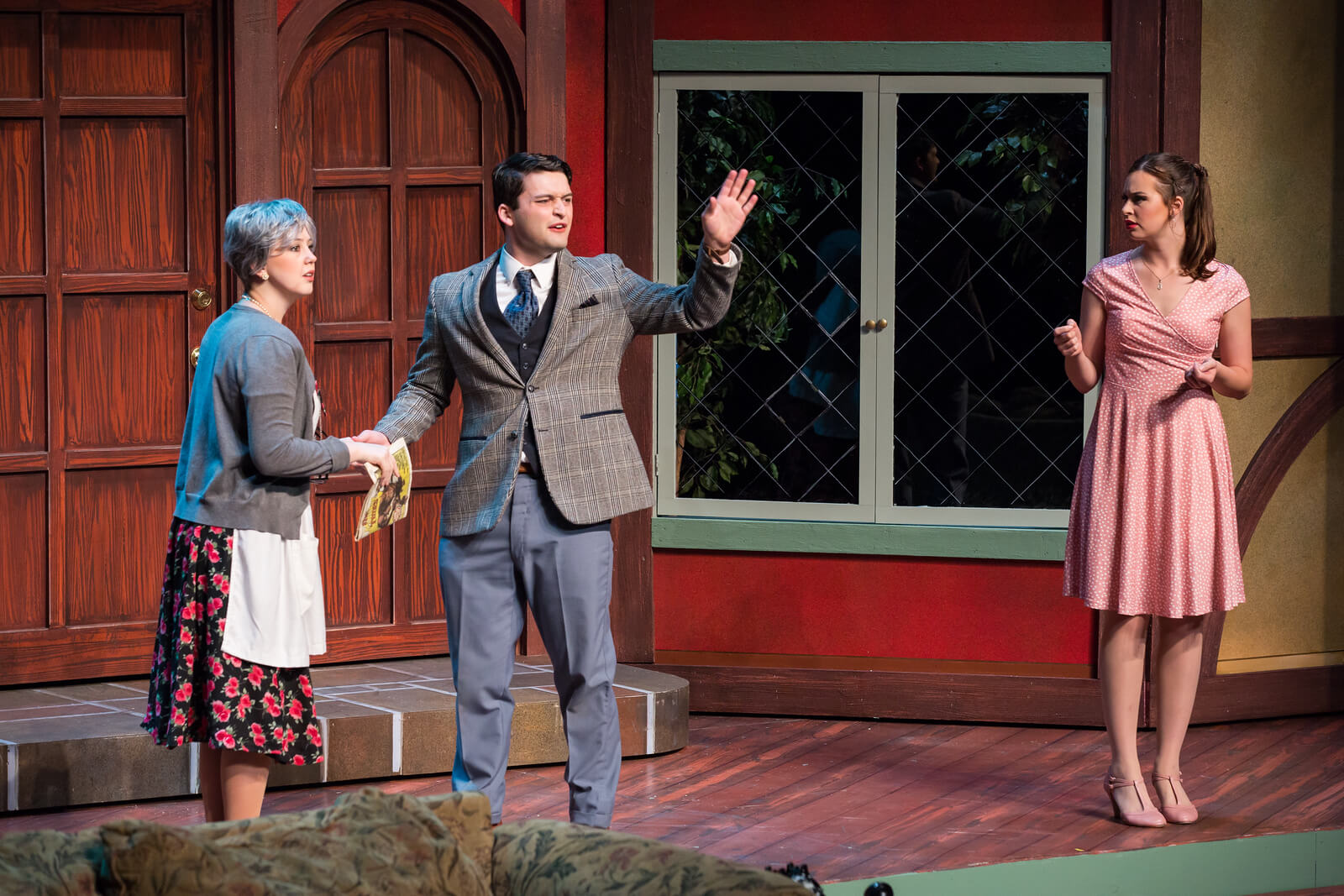 Three students on costume during the "Noises Off" performance.