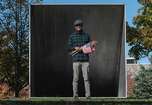 man holding the american flag